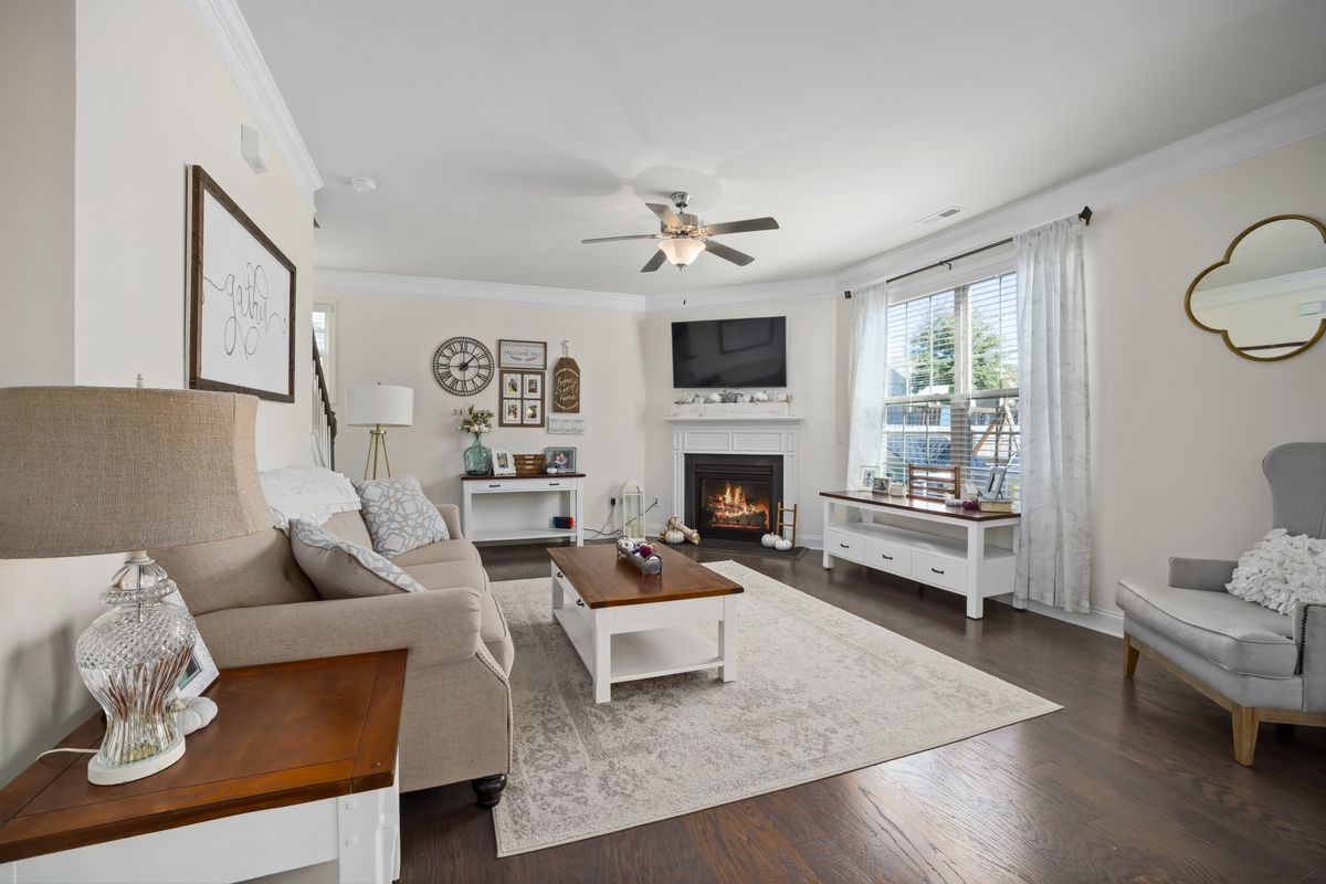 Living room with a beige sofa and warm neutral tones