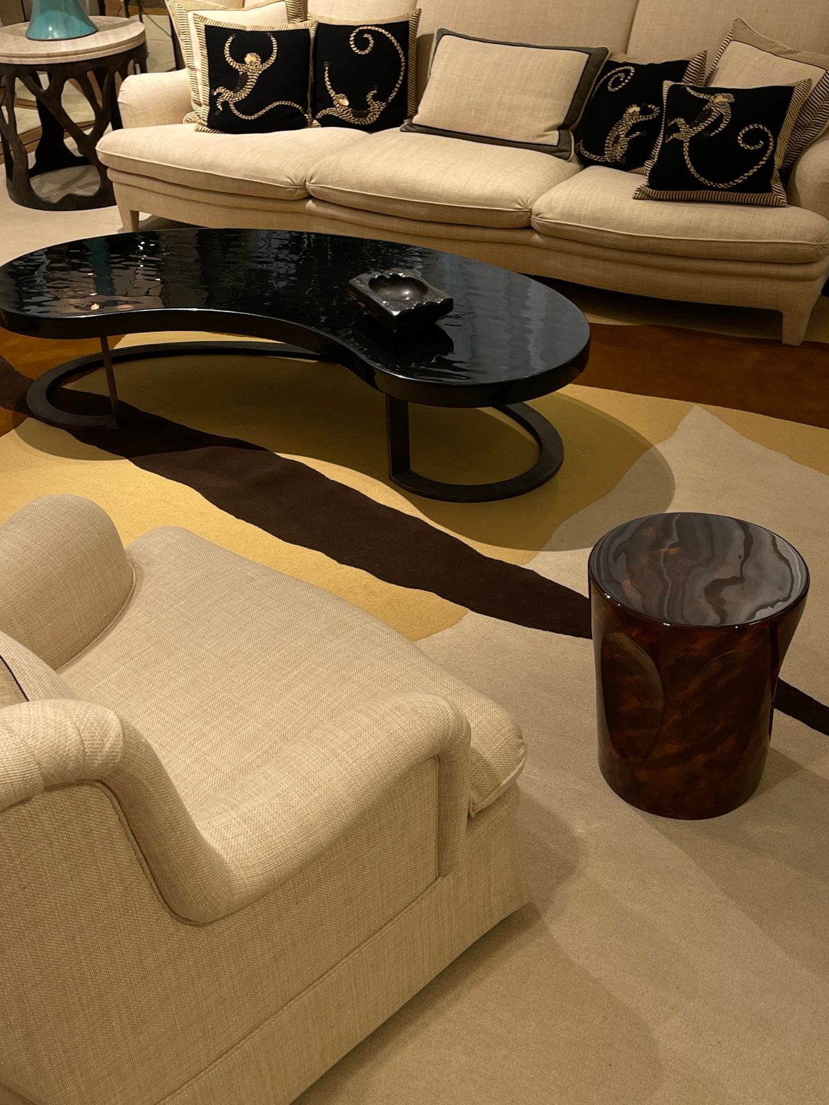 Black furniture and accents in a light interior