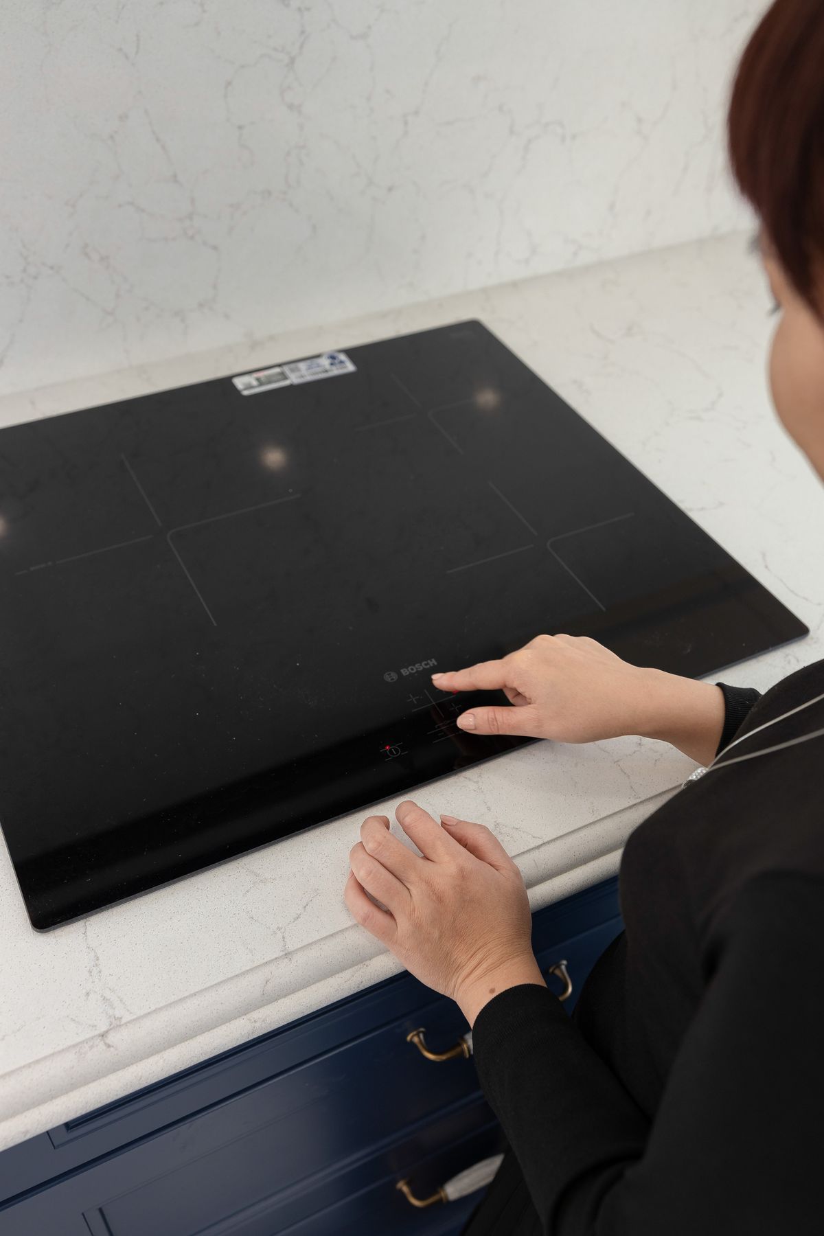 Black glass hob with touch controls