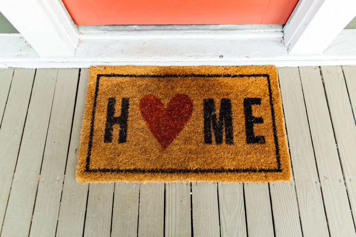 Fibre doormat beside a doorway