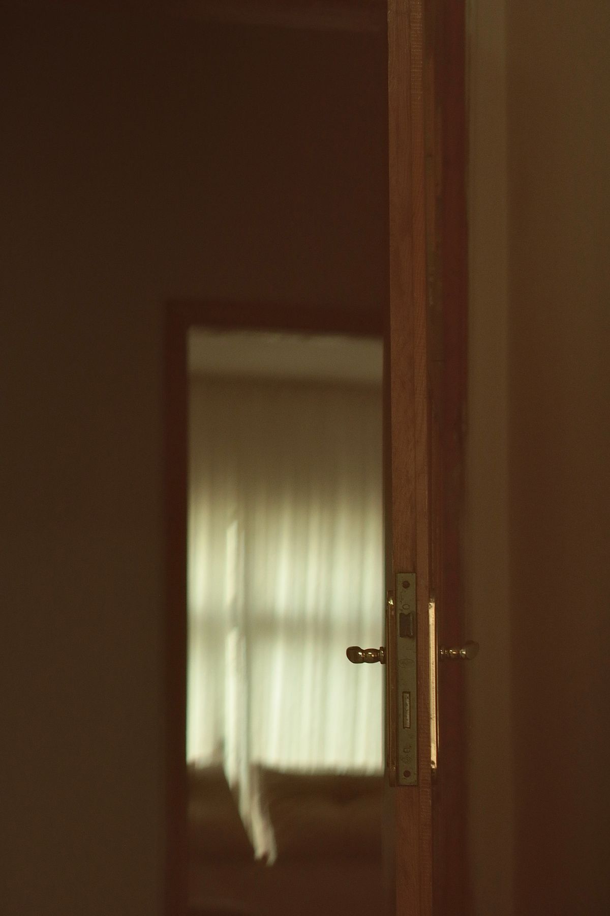Partly open door in a room